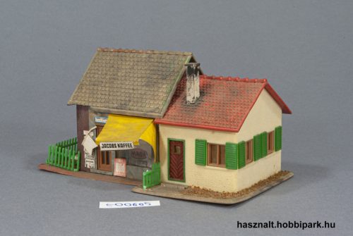 Ház üzlettel